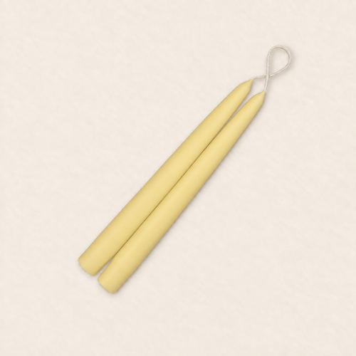 A pair of 9 inch Beeswax Natural taper candles, hand-dipped by Creative Candles
