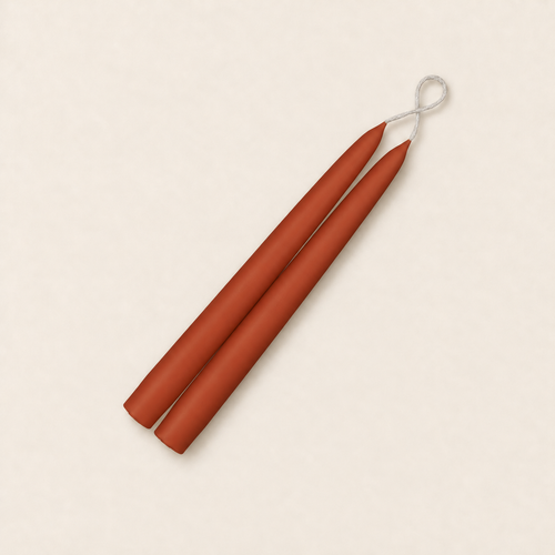 A pair of 9 inch Rust taper candles, hand-dipped by Creative Candles