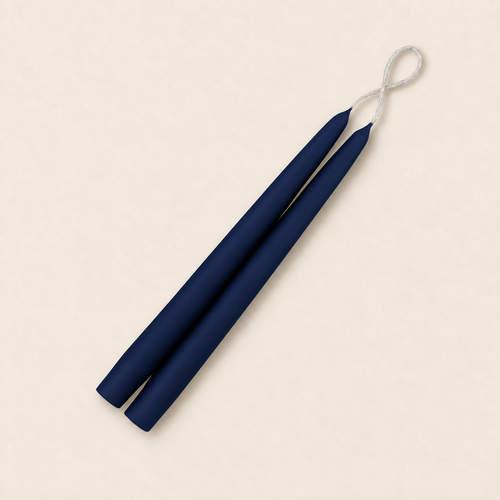 A pair of 9 inch Navy Blue taper candles, hand-dipped by Creative Candles