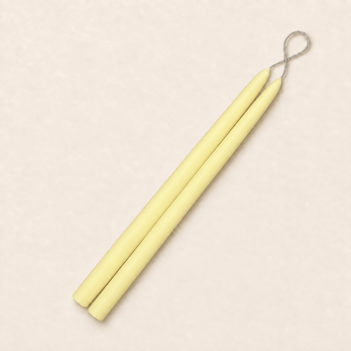A pair of 12 inch Lemon Chiffon taper candles, hand-dipped by Creative Candles