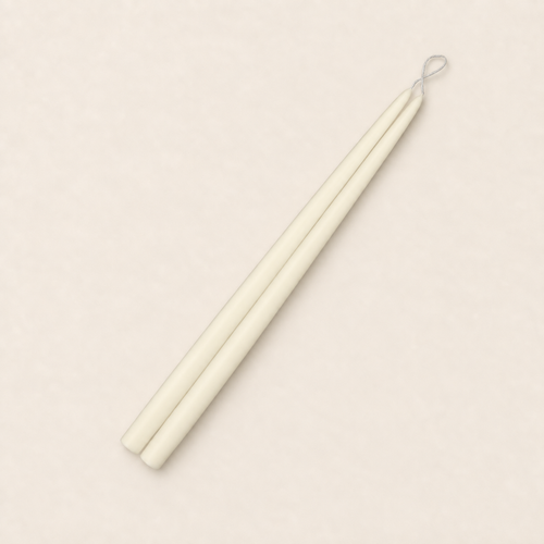 A pair of 15 inch Ivory taper candles, hand-dipped by Creative Candles