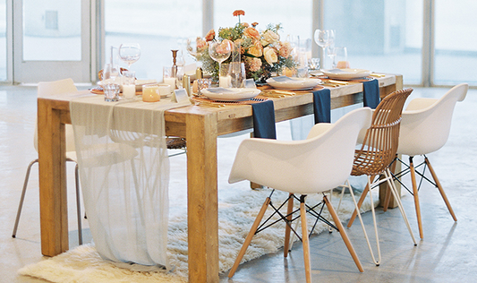 wood table white chairs