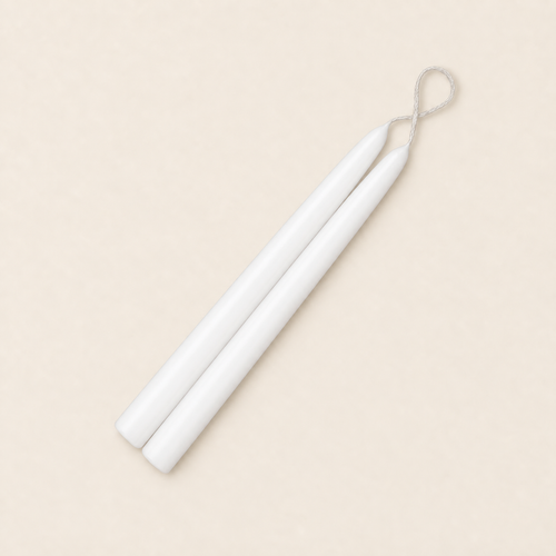 A pair of 9 inch White taper candles, hand-dipped by Creative Candles