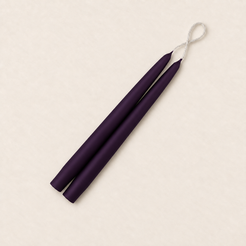 A pair of 9 inch Eggplant taper candles, hand-dipped by Creative Candles