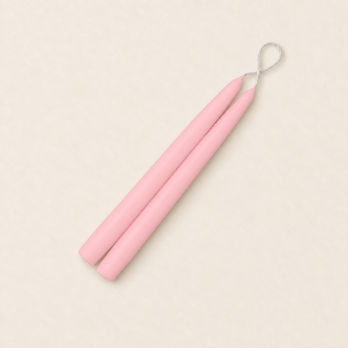 A pair of 9 inch Petal Pink taper candles, hand-dipped by Creative Candles