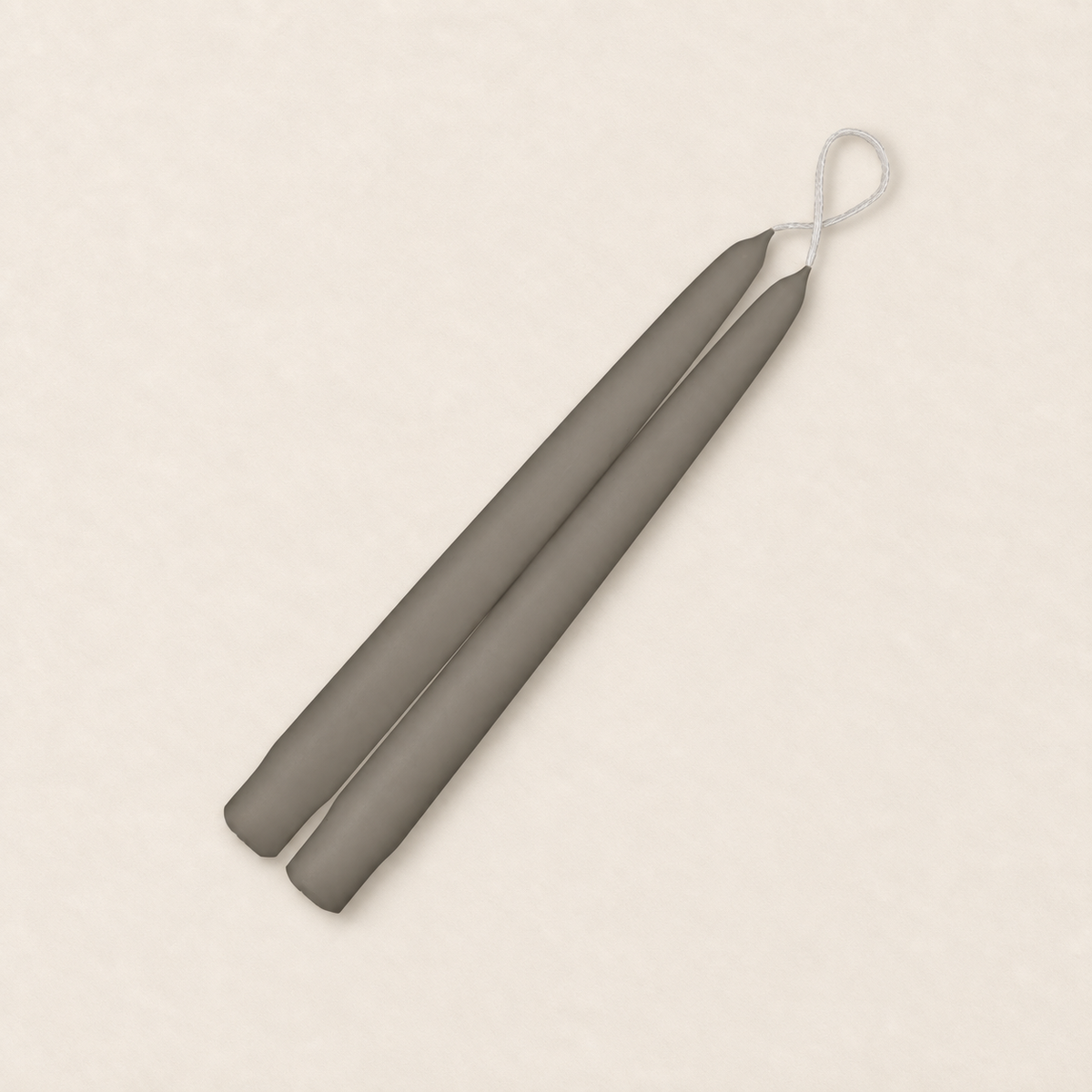 A pair of 9 inch Paris Gray taper candles, hand-dipped by Creative Candles