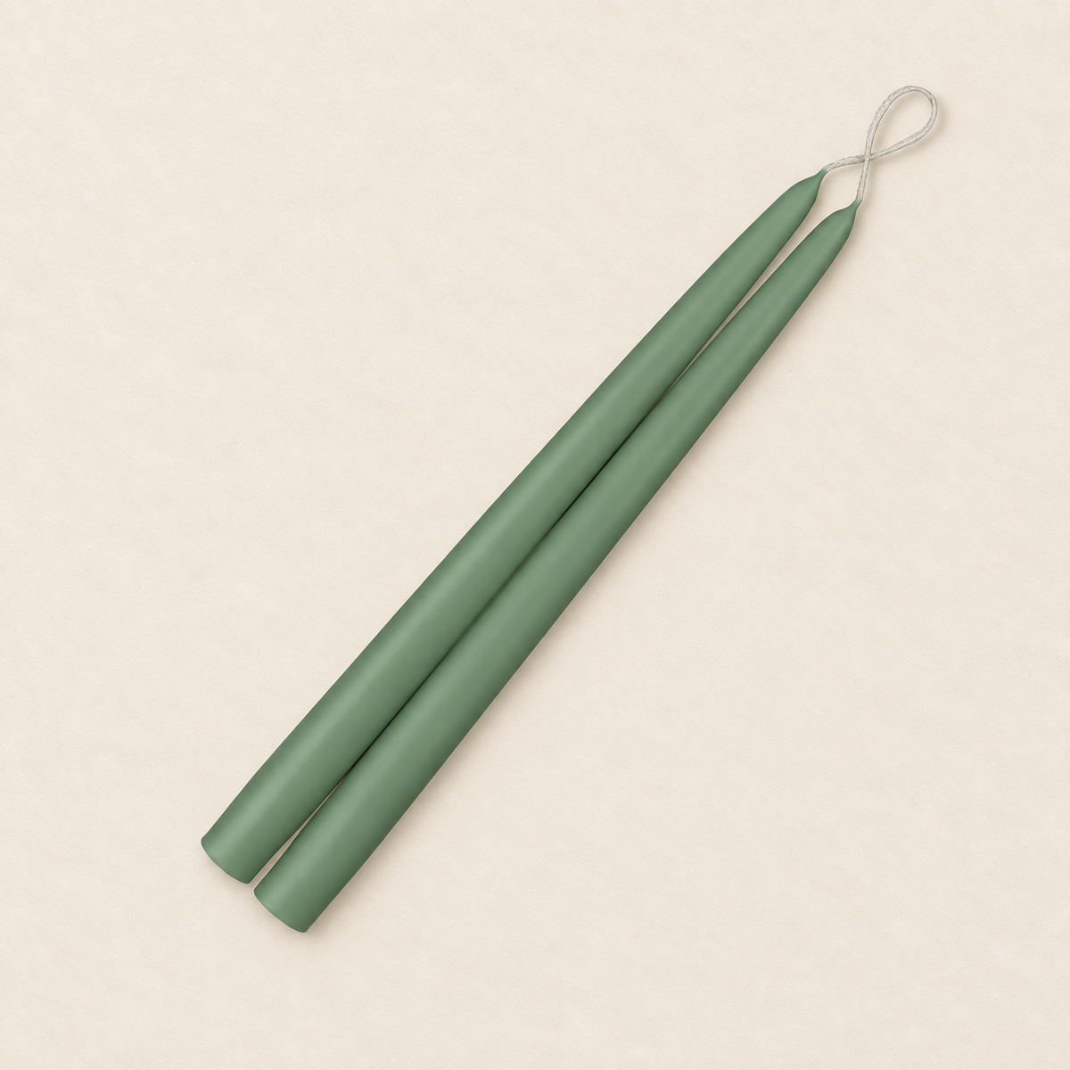 A pair of 12 inch Eucalyptus taper candles, hand-dipped by Creative Candles