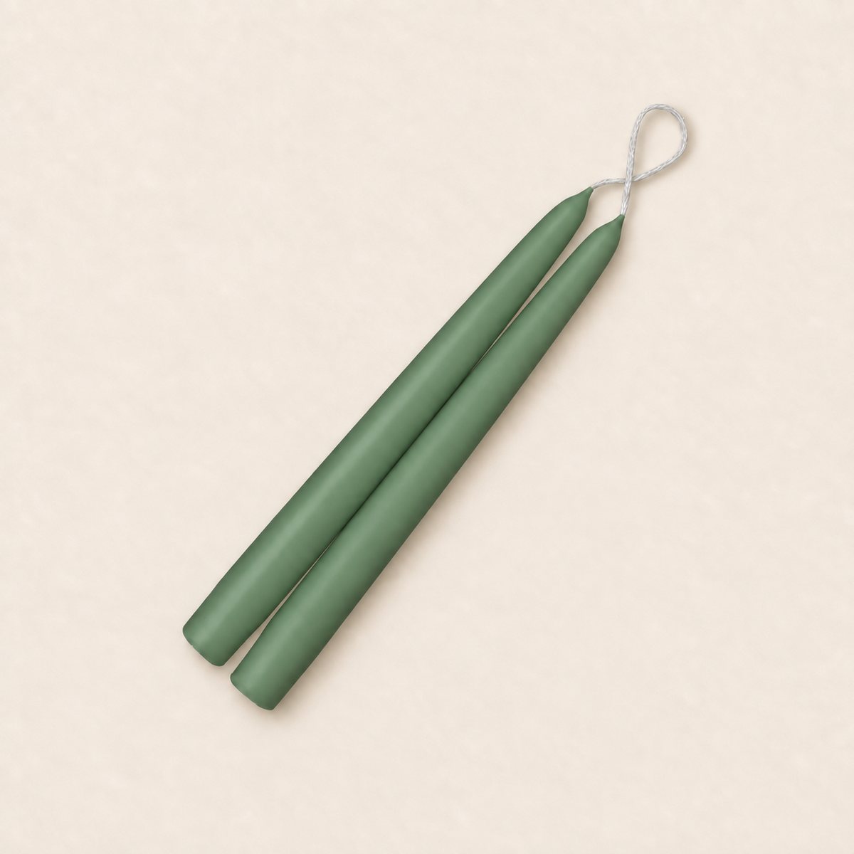 A pair of 9 inch Eucalyptus taper candles, hand-dipped by Creative Candles