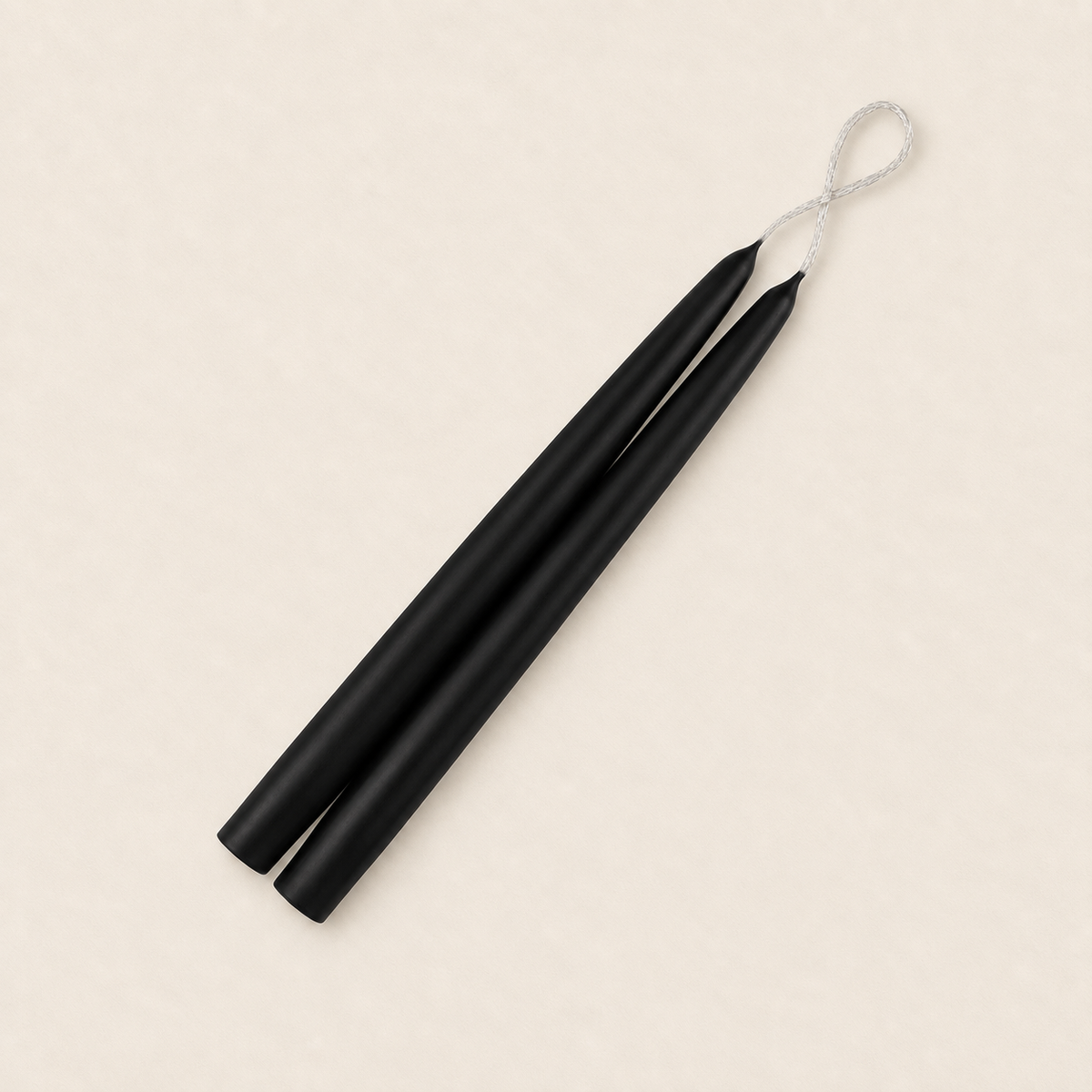 A pair of 9 inch Black taper candles, hand-dipped by Creative Candles