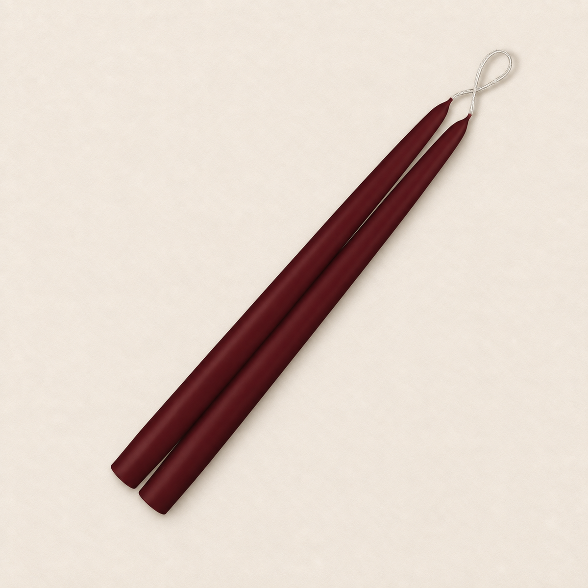 A pair of 12 inch French Bordeaux taper candles, hand-dipped by Creative Candles