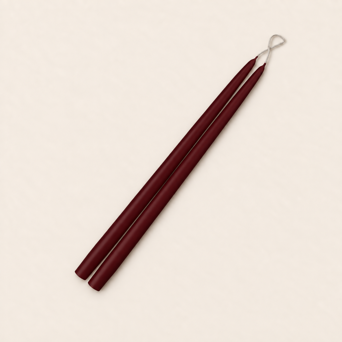 A pair of 15 inch French Bordeaux taper candles, hand-dipped by Creative Candles