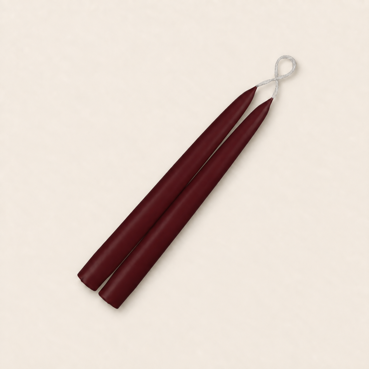A pair of 9 inch French Bordeaux taper candles, hand-dipped by Creative Candles