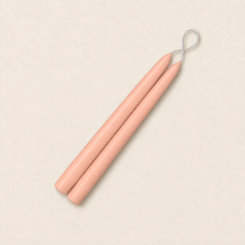 A pair of 9 inch Barely Blush taper candles, hand-dipped by Creative Candles
