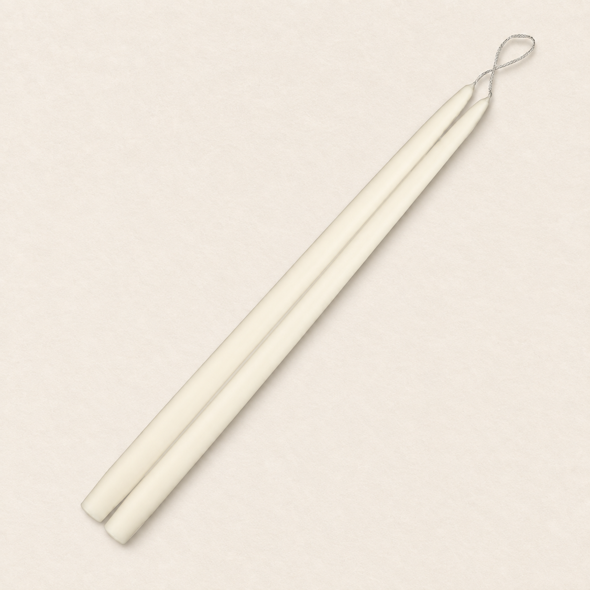 A pair of 18 inch Ivory taper candles, hand-dipped by Creative Candles