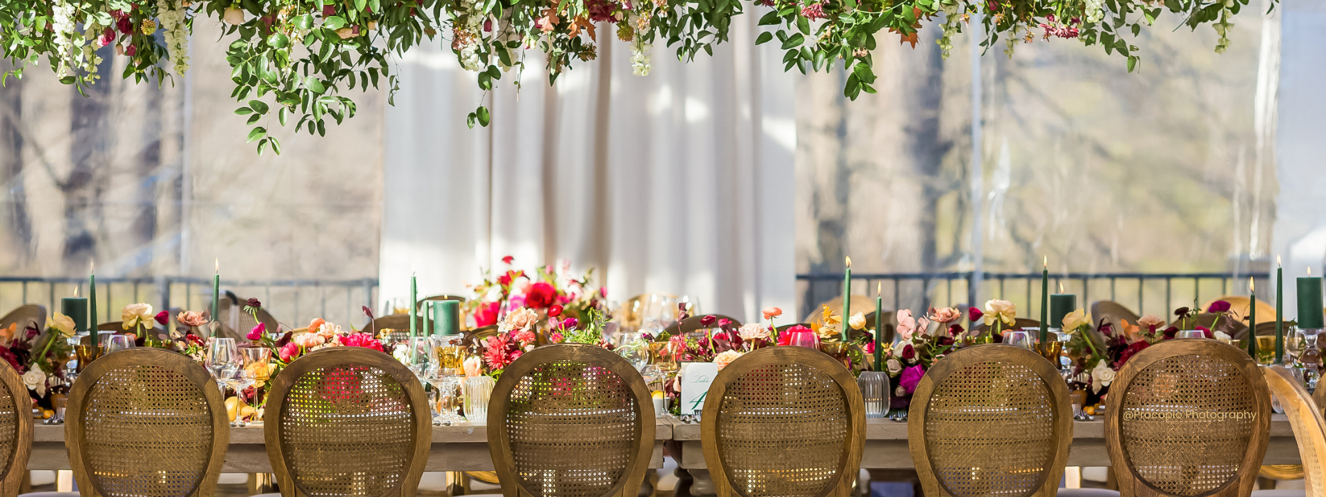 Wedding tablescape with Hunter Green pillars and tapers by procopio photography